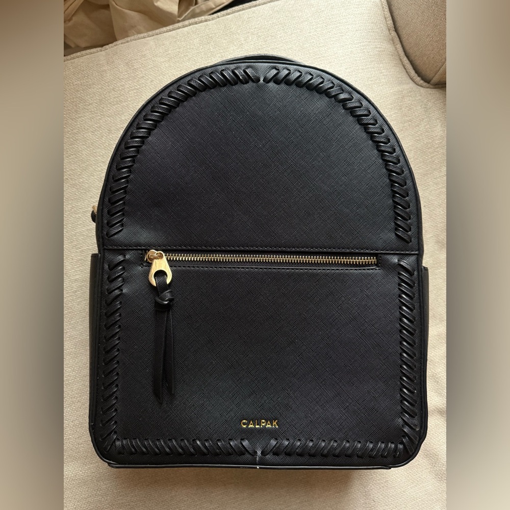 CALPAK "Kaya" Black faux leather rounded backpack
